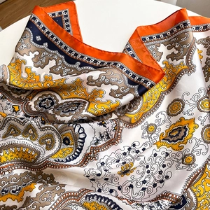 Elegant 90cm faux silk square scarf with paisley pattern and orange hand-rolled edges