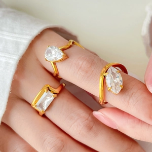 Minimalist 18K gold plated ring set with rectangular eye and teardrop zircon stones
