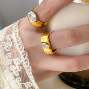 Macro shot of 18K gold plated rings with pear and marquise-cut zircon stones