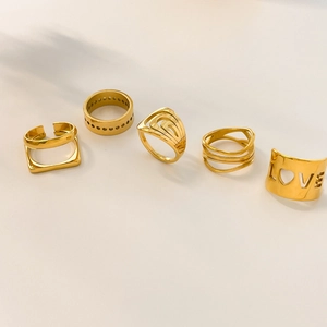 5-piece gold 18K plated stainless steel ring set with hollow LOVE and wavy designs
