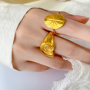 Elegant 18K gold plated titanium steel starburst and spiral charm ring for women