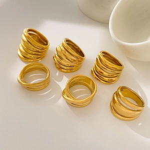 Set of 18K gold plated stainless steel multi-layer crossover rings with a minimalist design