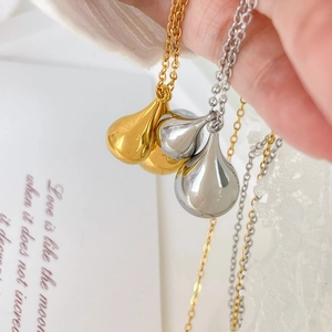 Polished teardrop pendant necklaces in gold and silver finish with snake chains