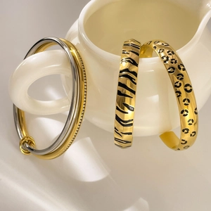 Three-piece leopard and tiger print 18K gold plated titanium bracelets with crystal accents