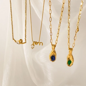 Vintage 18K gold plated snake chain necklace with zircon pendants and artistic hand charms