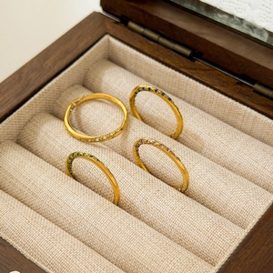 Set of four 18K gold plated titanium steel rings with colorful micro-inlaid stones