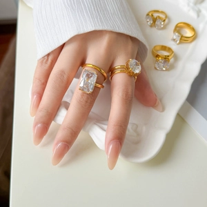 Luxurious 18K gold plated double-layered titanium ring with oval and rectangular zircon