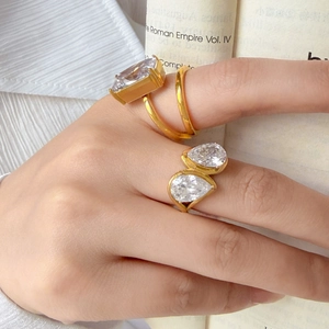 Double-layered 18K gold plated ring set with large rectangular and teardrop zircon stones