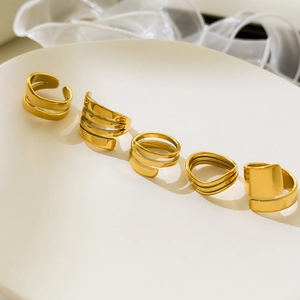 5-piece set of gold-plated stainless steel wide spiral open rings on white tray