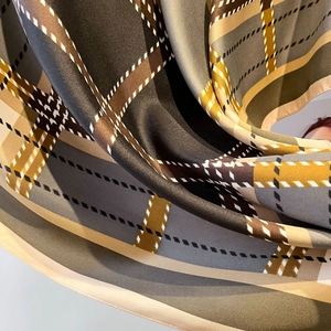 Plaid twill silk scarf for women featuring yellow and green patterns for sun protection