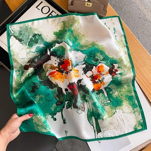 Floral print silk square scarf in green and white with elegant hand-rolled edges