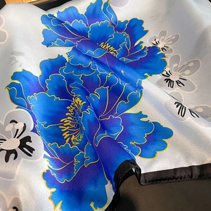 Elegant silver-blue silk scarf with blue peony floral print and black border detail