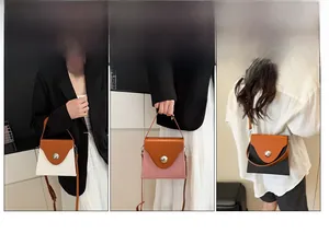 Vue détaillée du sac à main porté à la main, à l'épaule et en bandoulière stylée