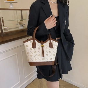 Retro monogrammed large tote bag with top handles and shoulder strap in cream and brown