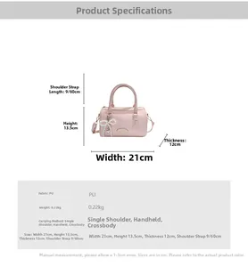 Detailed size specifications for pink PU leather pillow bag with pearl bow accessory
