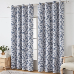 Blue floral cotton linen blackout curtains with grommet top in an elegant living room