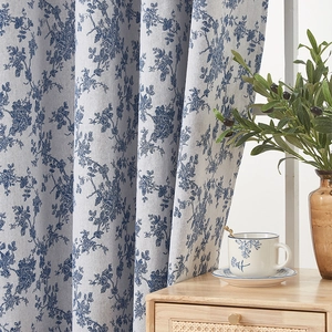 Light gray blackout curtains with blue floral patterns for living room in cottage style