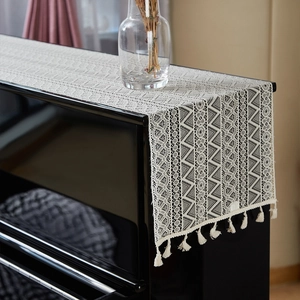 White lace piano runner with geometric hollow weave and tassel trim for home decor