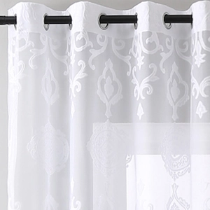 White sheer damask curtains with silver grommet top for elegant bedroom lighting