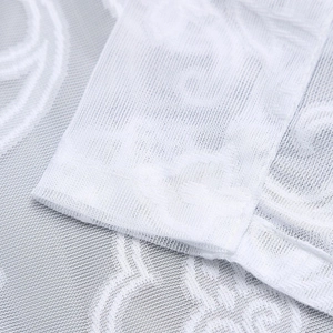 White lace curtain detail featuring honeycomb mesh fabric and neat double-stitched edging