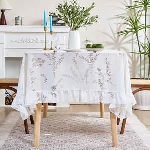 Rustic lavender style rectangular tablecloth with floral patterns and ruffled edges