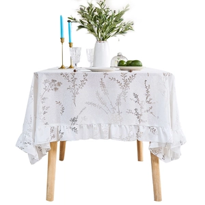 Lavender floral white tablecloth with ruffle edges and elegant botanical prints