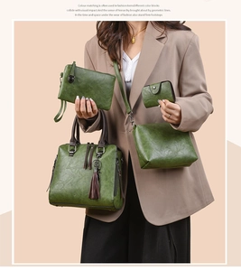 Detail view of the 4-piece vintage green tote bag set including handbags and pouches