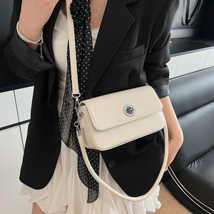 Chic beige square crossbody bag with silver buckle and adjustable strap for women