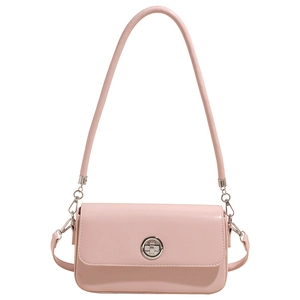 Minimalist light pink rectangular crossbody bag with silver round buckle and slim strap