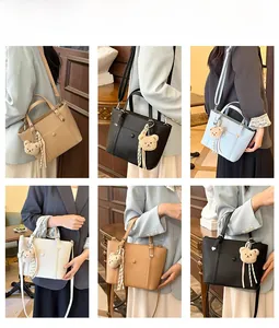 Détails de sacs fourre-tout élégants en plusieurs couleurs avec breloque ours et sangle