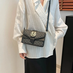 French minimalist crossbody bag with grey M-letter jacquard and golden metal buckle