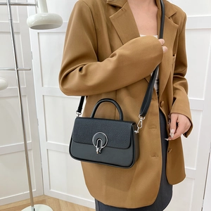 Fashionable black matte leather crossbody handbag with round silver clasp for women