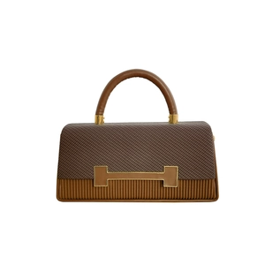 Brown patchwork box bag with weave texture, vertical stripes and golden H buckle