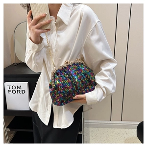 Detailed view of colorful mermaid sequin shell bag with gold chain strap