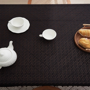 Brown rectangular tablecloth with Greek key pattern and woven texture for dining tables
