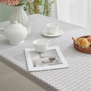 Close-up of white and grey geometric Greek key pattern waterproof tablecloth texture