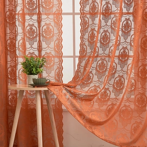 French retro orange lace curtain with damascus floral pattern in sunny room decor