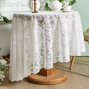 French country style white lace round tablecloth with elegant floral patterns and ruffled edges