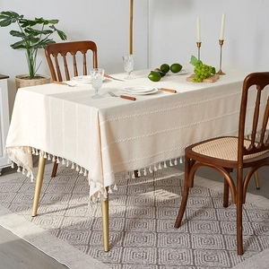 Rectangular beige cotton linen tablecloth with boho tassels and embroidered stitching