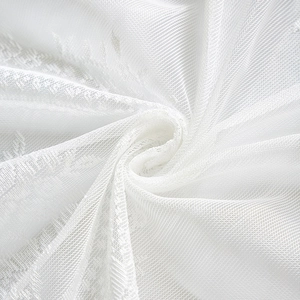 French vintage white lace door curtain with delicate embroidery and draped mesh texture