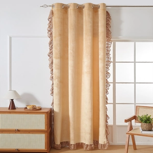 Beige velvet blackout curtain with brown lace trim and silver metal grommets