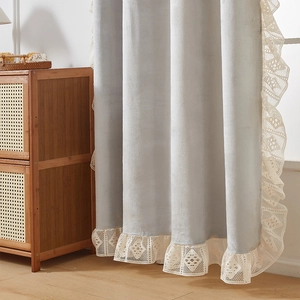 Elegant light blue chenille blackout curtain with delicate white lace ruffle edges