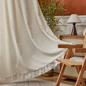 Linen blackout curtain with ruffled edges and elegant flower embroidery for cozy living room