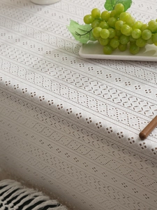 Detail of Nordic retro lace tablecloth featuring hollow diamond patterns and elegant drape