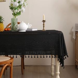 Elegant black hollow lace tablecloth with crochet tassel trim for vintage dining decor