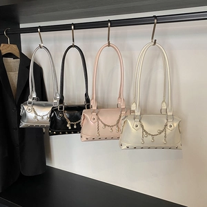 Fashionable tote bags with rivet detail and pearl chain in silver, black, pink and white