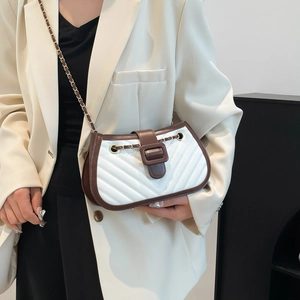 Chic quilted crossbody bag in white and brown leather with a gold chain strap