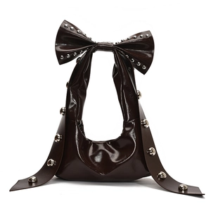 Chic dark brown faux leather shoulder bag with oversized bow and silver stud accents