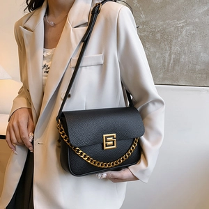 Chic black litchi pattern leather shoulder bag with gold chain and metal buckle detail