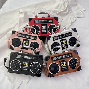 Retro radio shaped crossbody bag in five colors with metal handle and shoulder strap